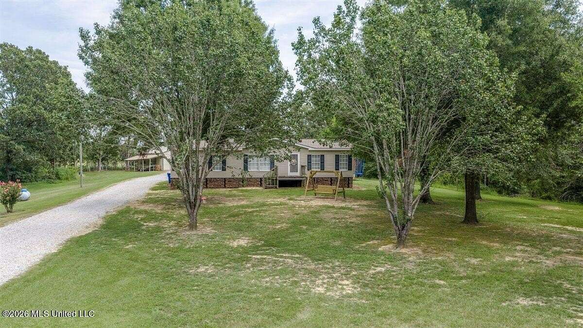 8.5 Acres of Land with Home for Sale in Sardis, Mississippi