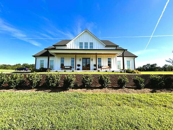 35.6 Acres of Land with Home for Sale in Westmoreland, Tennessee