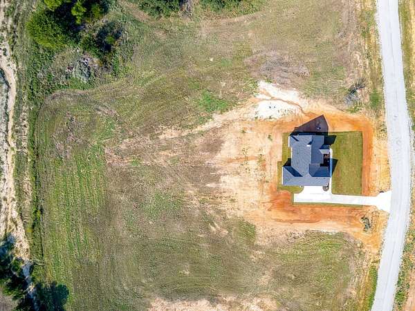 6 Acres of Land with Home for Sale in Poolville, Texas