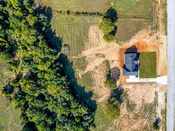 2 Acres of Land with Home for Sale in Poolville, Texas