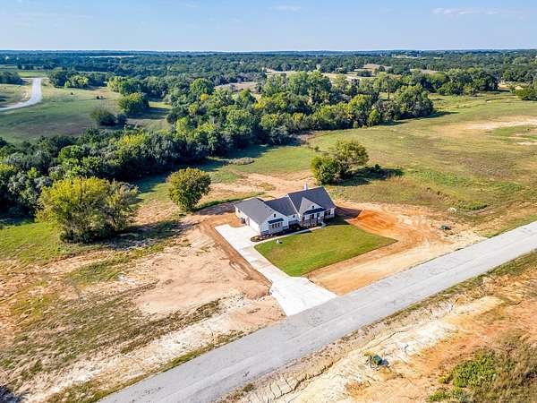 6 Acres of Land with Home for Sale in Poolville, Texas