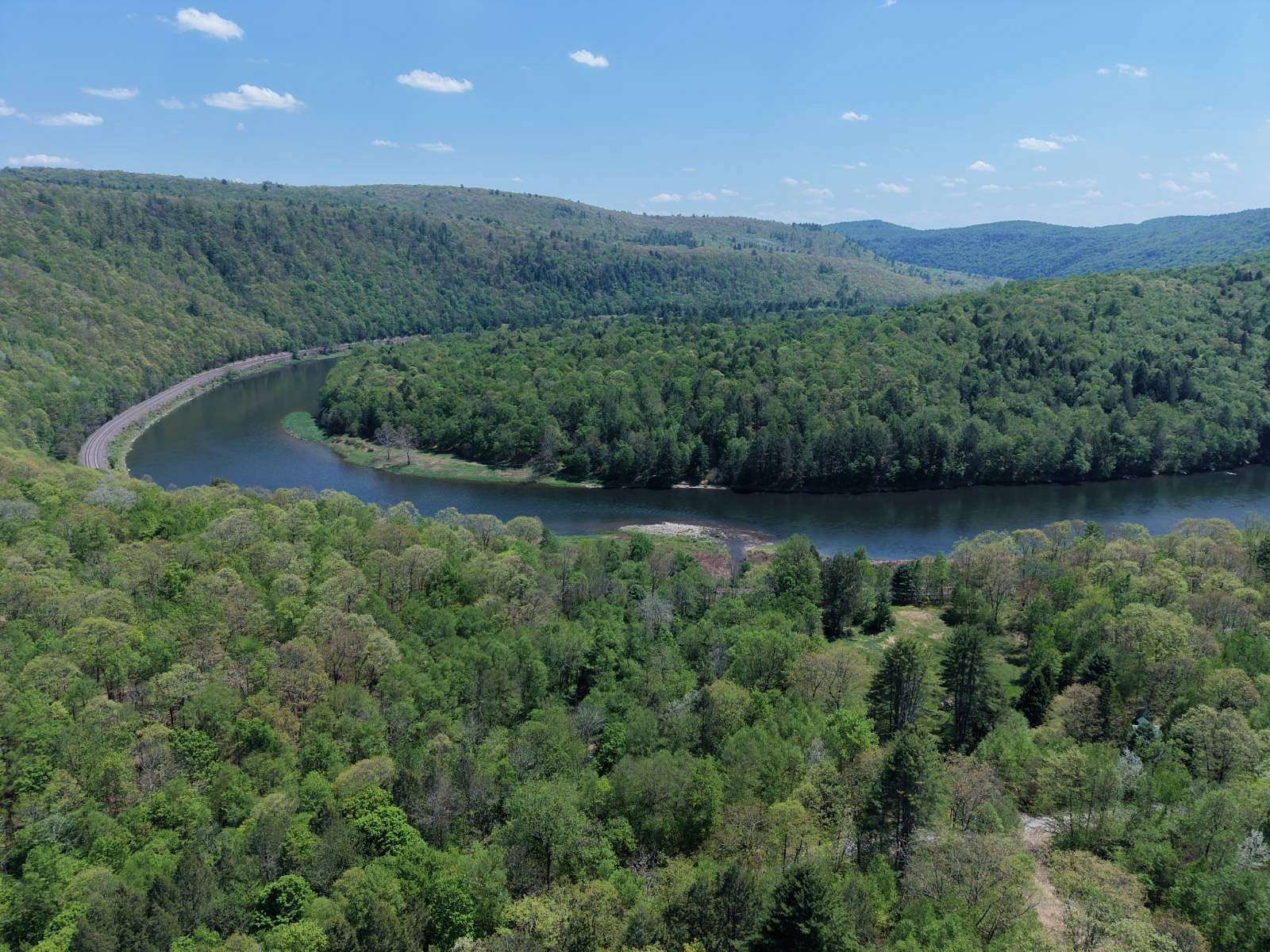 5.56 Acres of Land with Home for Sale in Hancock, New York