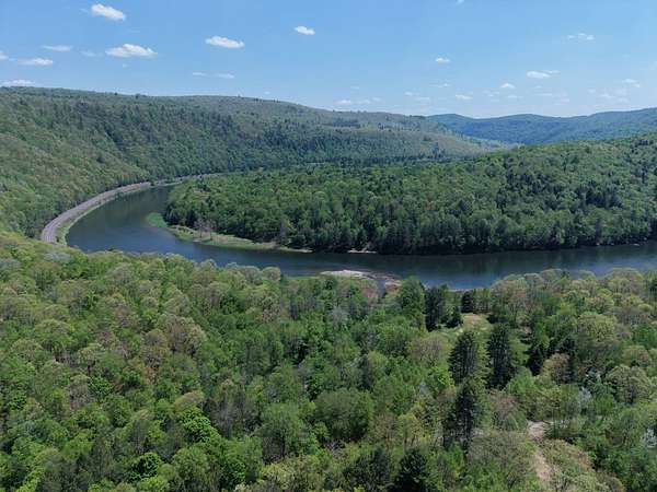 5.56 Acres of Land with Home for Sale in Hancock, New York