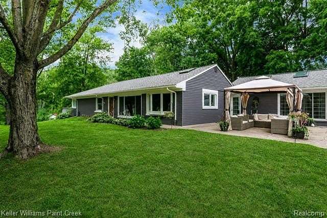 1.88 Acres of Land with Home for Sale in Oakland Charter Township, Michigan