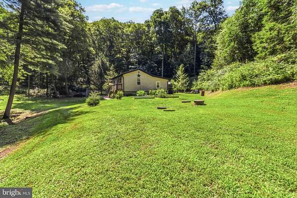8.6 Acres of Land with Home for Sale in Elliottsburg, Pennsylvania