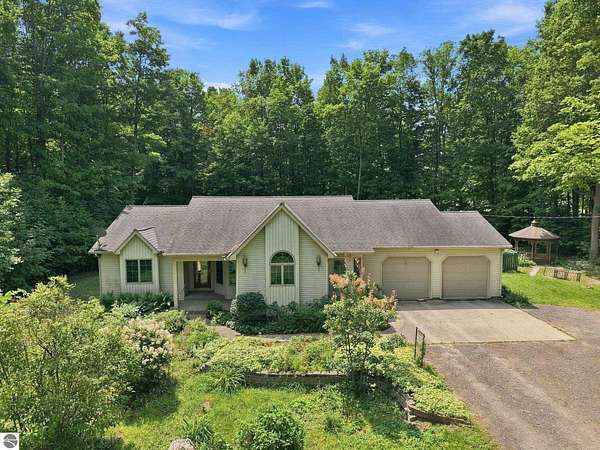 5.62 Acres of Land with Home for Sale in Cadillac, Michigan