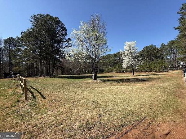 5 Acres of Land with Home for Sale in Cumming, Georgia