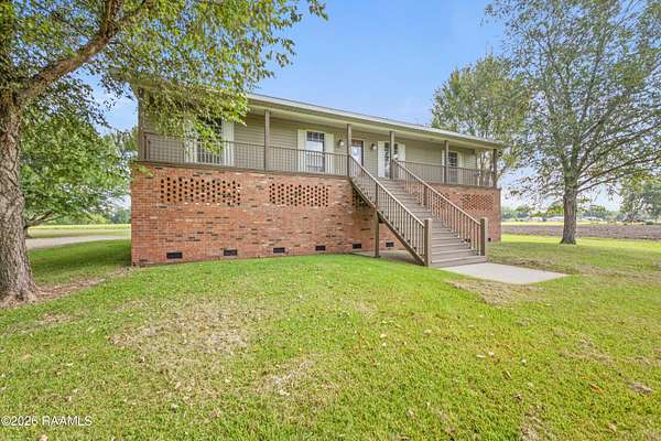 10.6 Acres of Land with Home for Sale in Scott, Louisiana