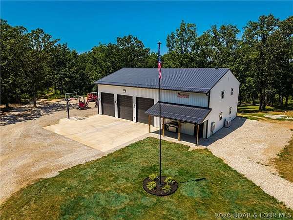 10.4 Acres of Land with Home for Sale in Eldon, Missouri