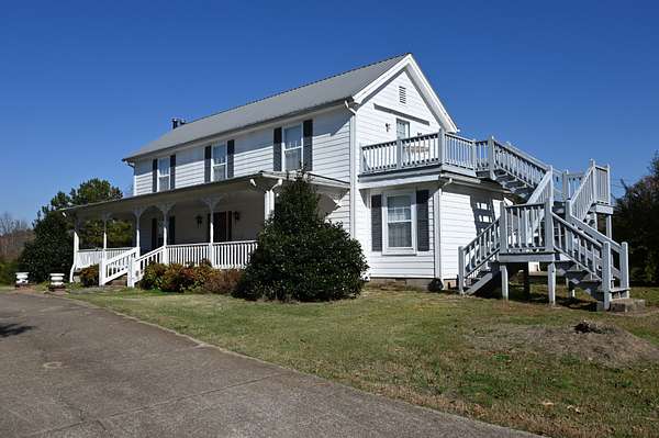 35.2 Acres of Recreational Land with Home for Auction in Linden, Tennessee
