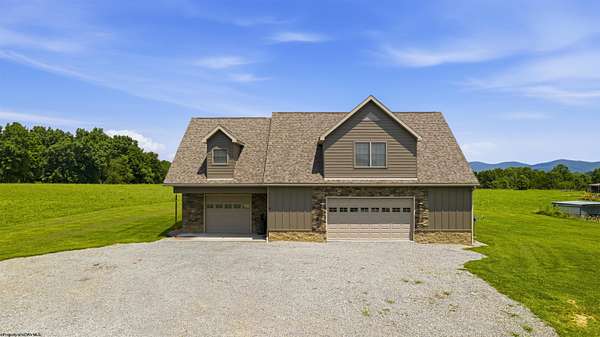 29.2 Acres of Land with Home for Sale in Belington, West Virginia