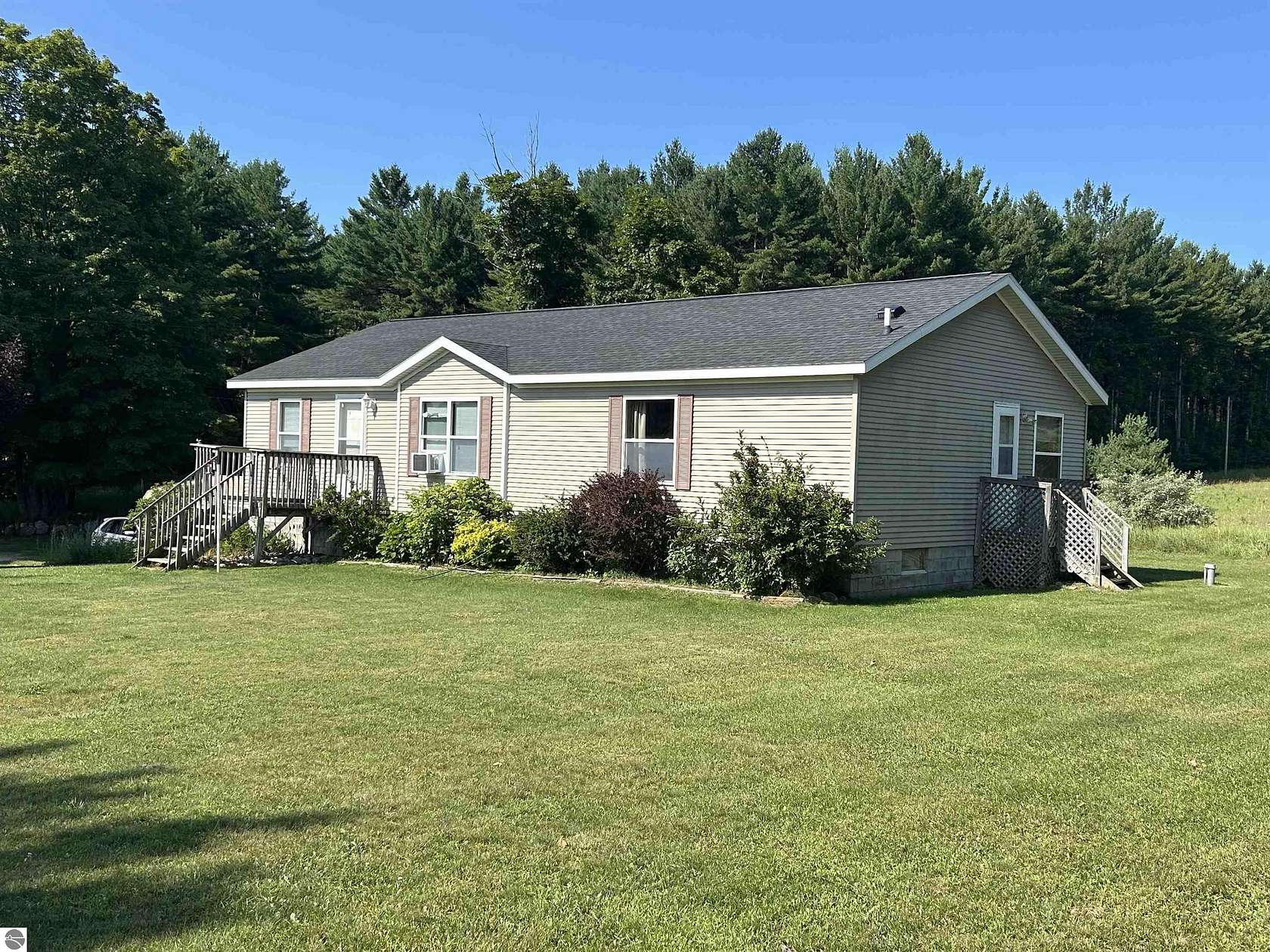 3 Acres of Land with Home for Sale in Central Lake, Michigan