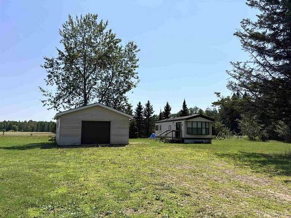 2 Acres of Land with Home for Sale in Cornell, Michigan