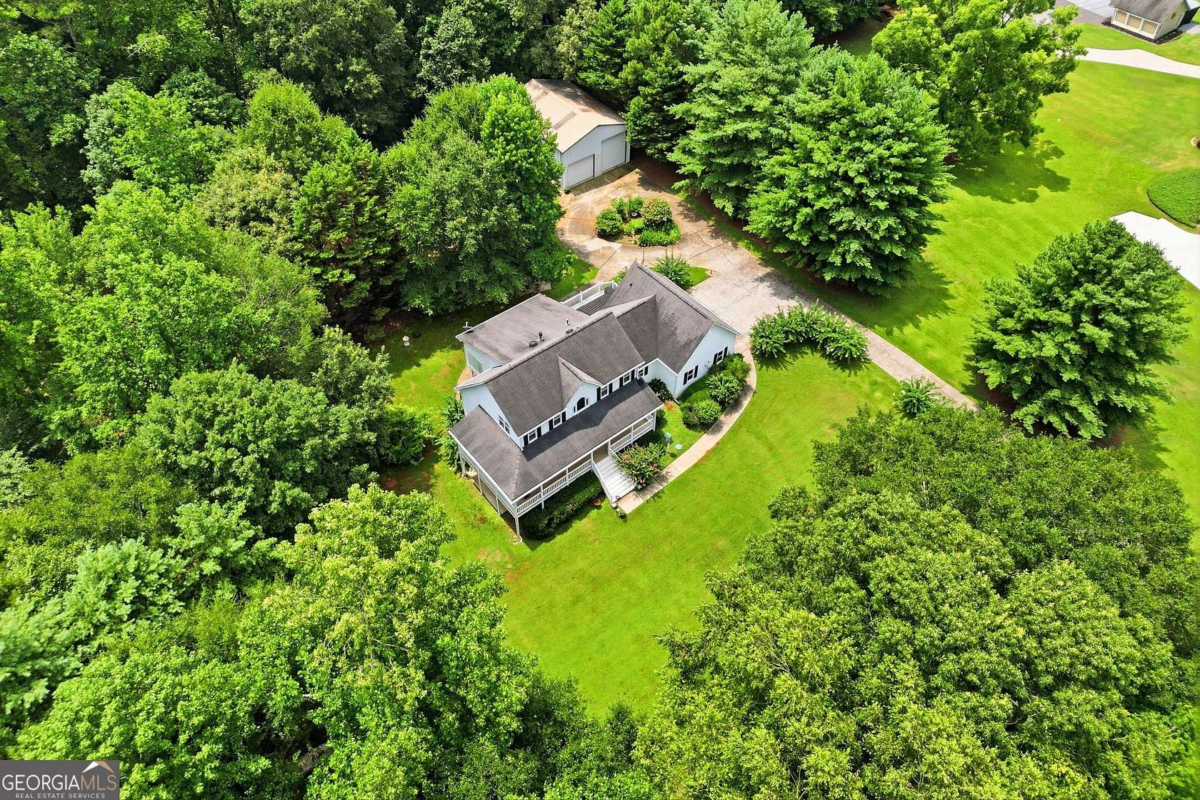2.35 Acres of Land with Home for Sale in Woodstock, Georgia