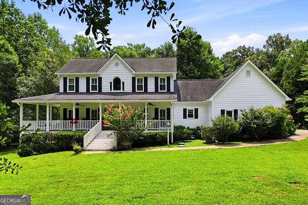 2.35 Acres of Land with Home for Sale in Woodstock, Georgia