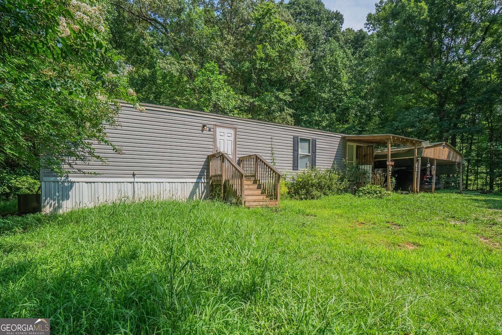1.8 Acres of Land with Home for Sale in Commerce, Georgia