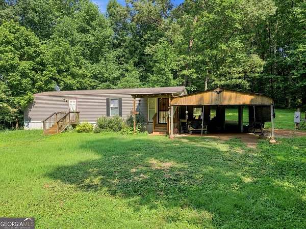 1.8 Acres of Land with Home for Sale in Commerce, Georgia