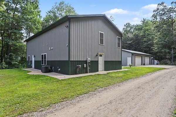13.1 Acres of Recreational Land with Home for Sale in Athens, Michigan