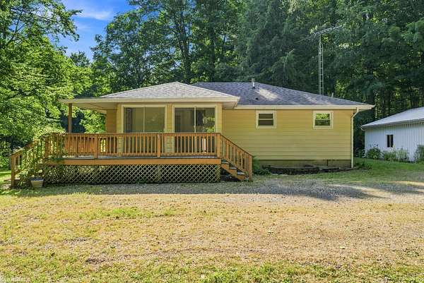 18 Acres of Recreational Land with Home for Sale in Croswell, Michigan