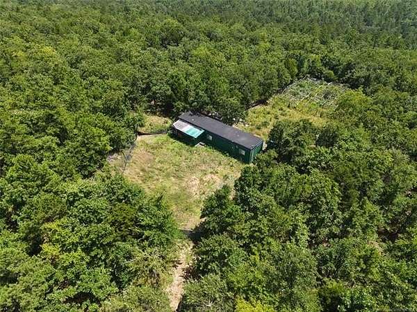 22.3 Acres of Land with Home for Sale in Wister, Oklahoma