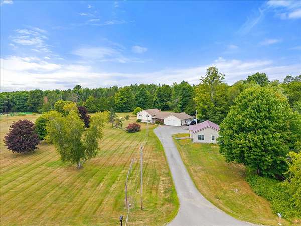 4.8 Acres of Improved Mixed-Use Land for Sale in Corinth Town, Maine