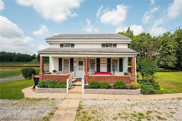3.14 Acres of Land with Home for Auction in Uniontown, Ohio