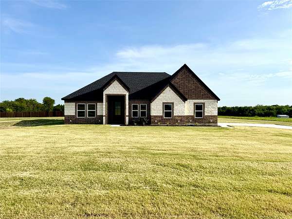 1.5 Acres of Land with Home for Sale in Greenville, Texas