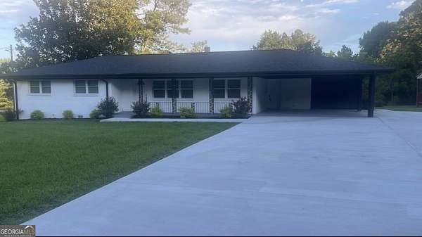 3.77 Acres of Land with Home for Sale in Conyers, Georgia