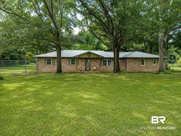 7.49 Acres of Land with Home for Sale in Robertsdale, Alabama