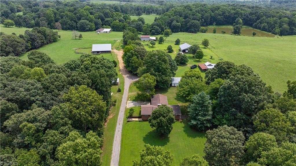 153 Acres of Land with Home for Sale in Liberty, North Carolina