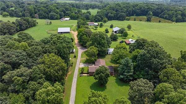 153 Acres of Land with Home for Sale in Liberty, North Carolina