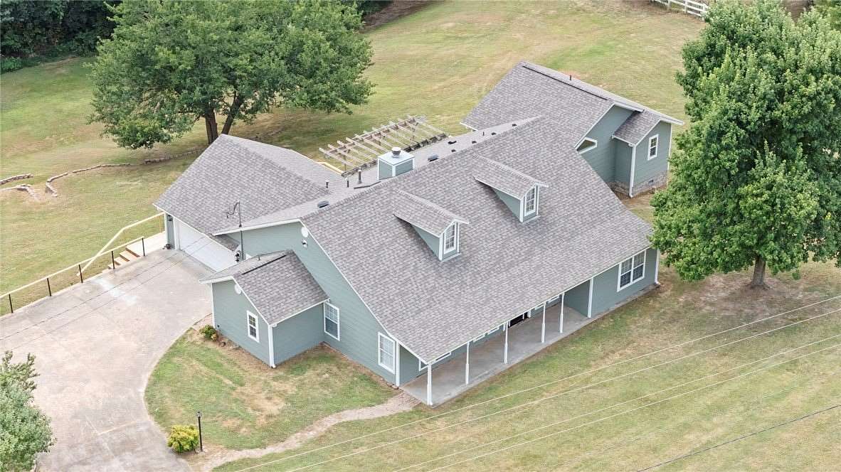 1.79 Acres of Land with Home for Sale in Tontitown, Arkansas