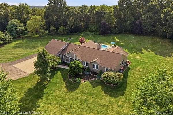 2.5 Acres of Land with Home for Sale in Oceola Township, Michigan
