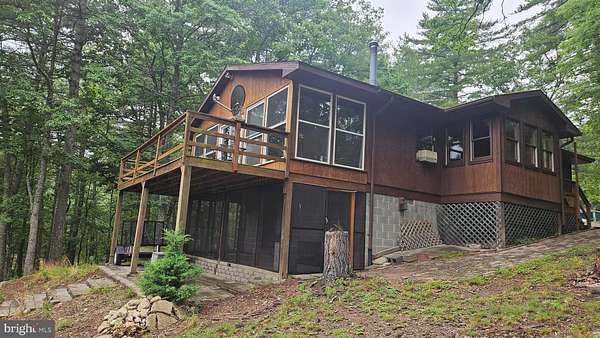3.82 Acres of Land with Home for Sale in Great Cacapon, West Virginia