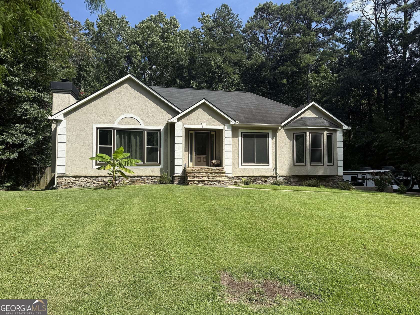 1.75 Acres of Land with Home for Sale in Sharpsburg, Georgia