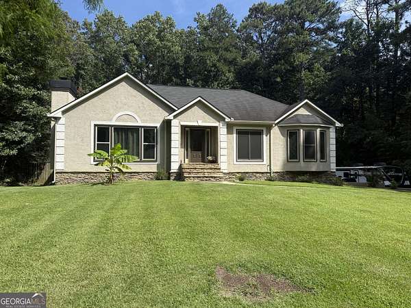 1.75 Acres of Land with Home for Sale in Sharpsburg, Georgia