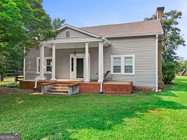 30.7 Acres of Land with Home for Sale in Gay, Georgia