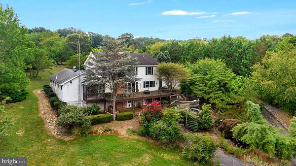 5 Acres of Land with Home for Sale in Falling Waters, West Virginia