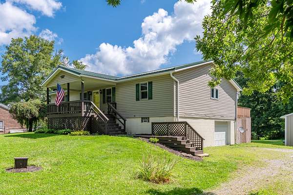 2 Acres of Land with Home for Sale in Cable, Ohio