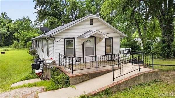 5.8 Acres of Land with Home for Sale in Caseyville, Illinois