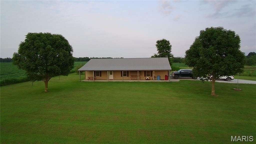 20.5 Acres of Recreational Land with Home for Sale in Holliday, Missouri