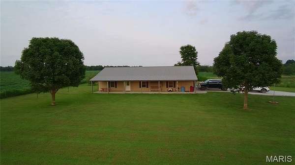 20.5 Acres of Recreational Land with Home for Sale in Holliday, Missouri