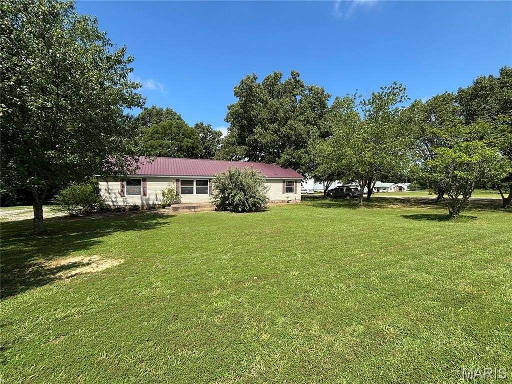 3.9 Acres of Land with Home for Sale in Dexter, Missouri