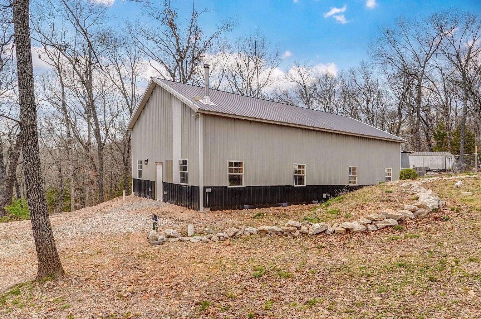 4.72 Acres of Land with Home for Sale in Crane, Missouri