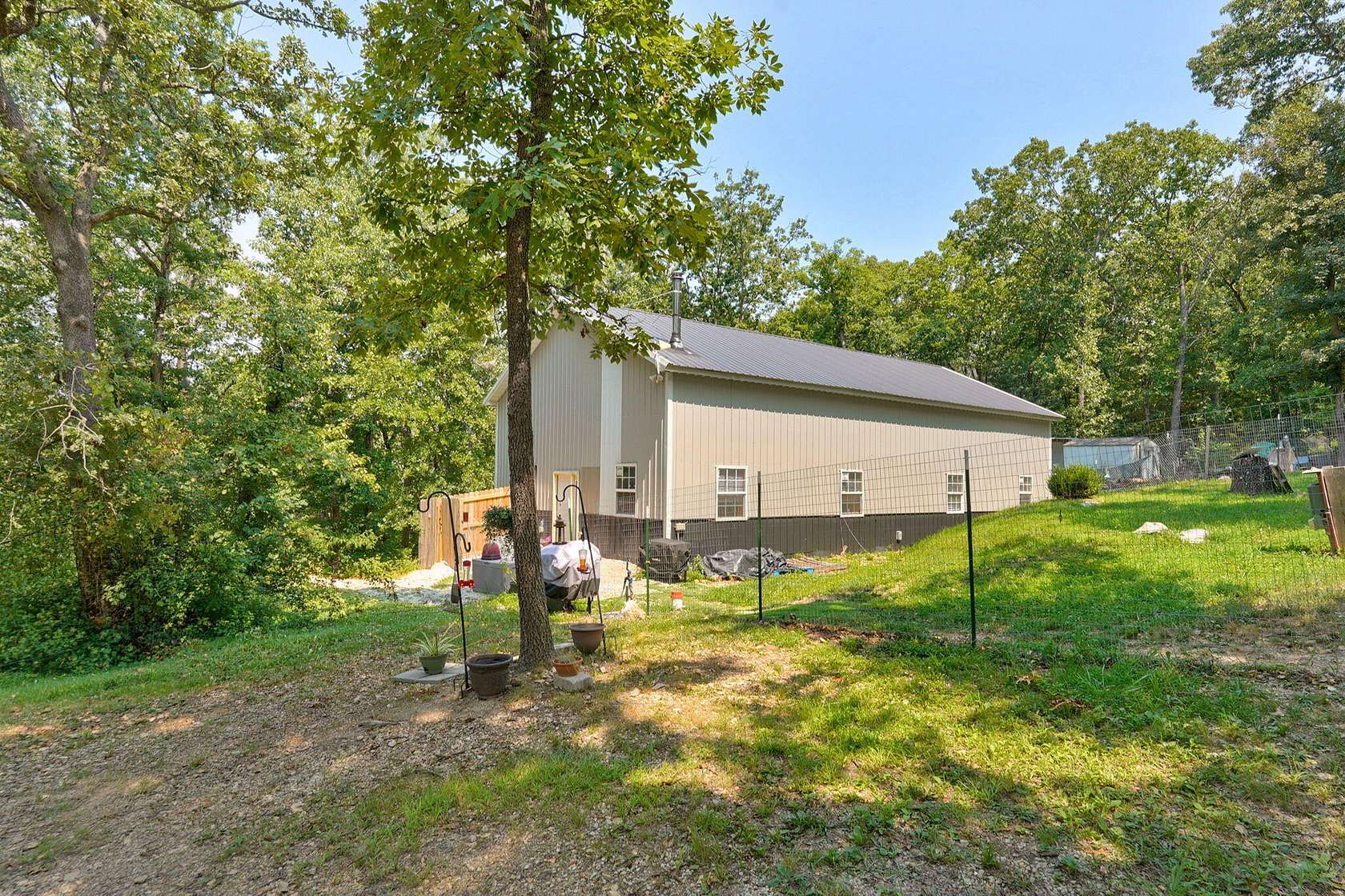 4.72 Acres of Land with Home for Sale in Crane, Missouri