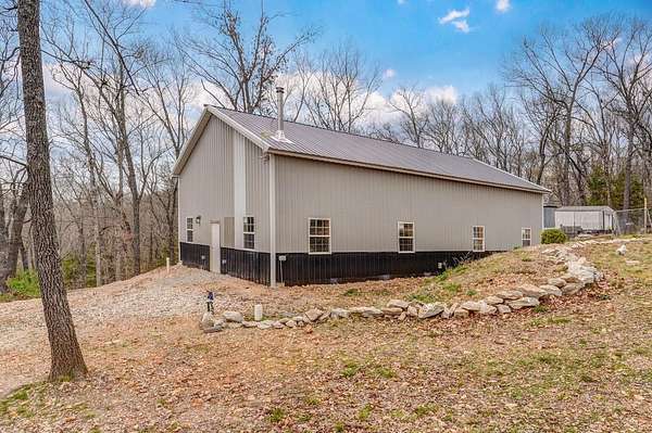 4.72 Acres of Land with Home for Sale in Crane, Missouri