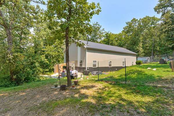 4.72 Acres of Land with Home for Sale in Crane, Missouri