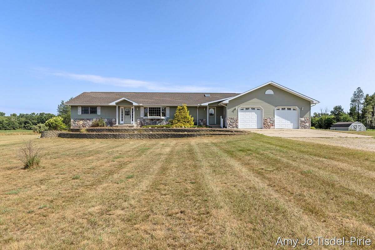 2.5 Acres of Land with Home for Sale in Pierson, Michigan