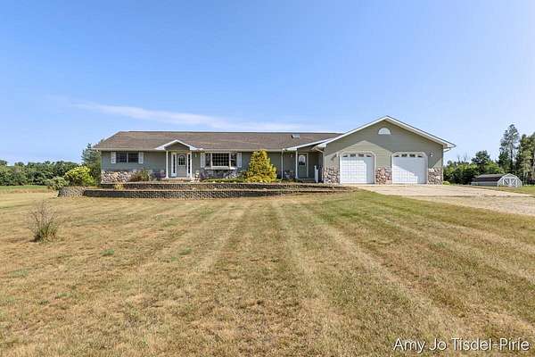 2.5 Acres of Land with Home for Sale in Pierson, Michigan