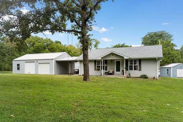 6.44 Acres of Land with Home for Sale in Marshfield, Missouri